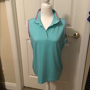 Nike golf shirt turquoise with pink trim. L